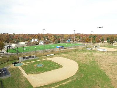 A drone flying over AACC's baseball field